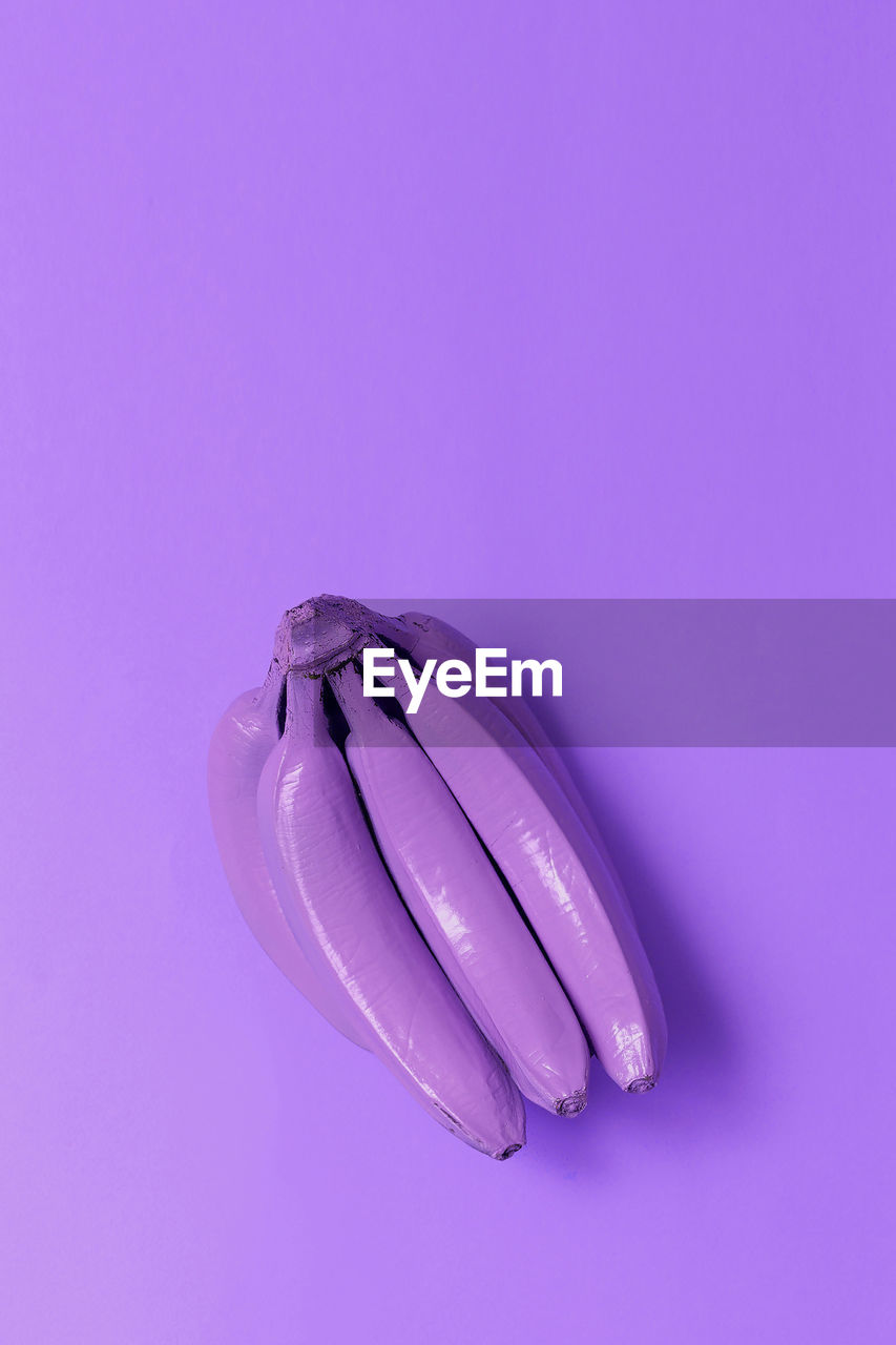 Pink bananas on a pink background. surreal minimal art