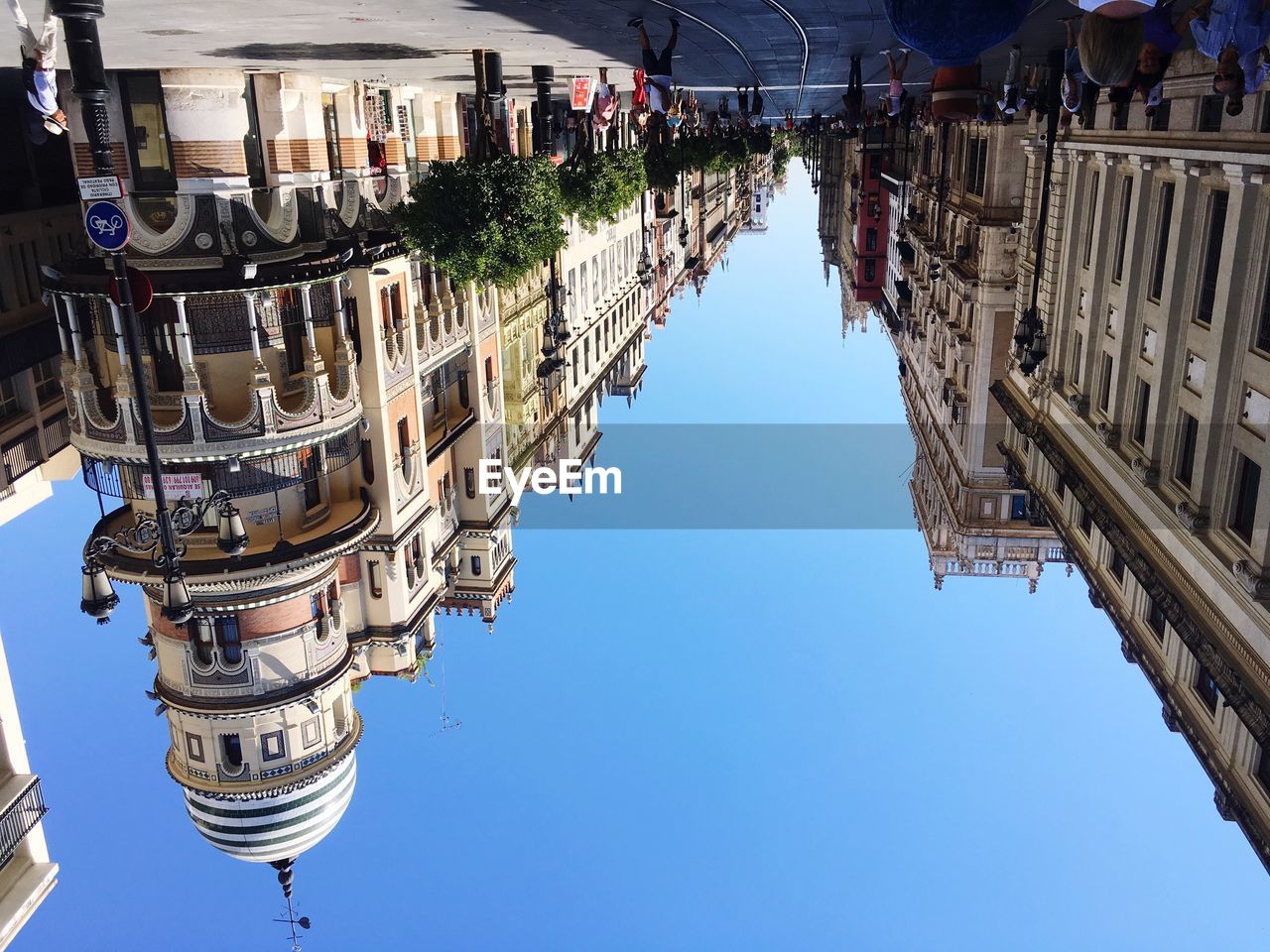 LOW ANGLE VIEW OF CITY AGAINST CLEAR SKY