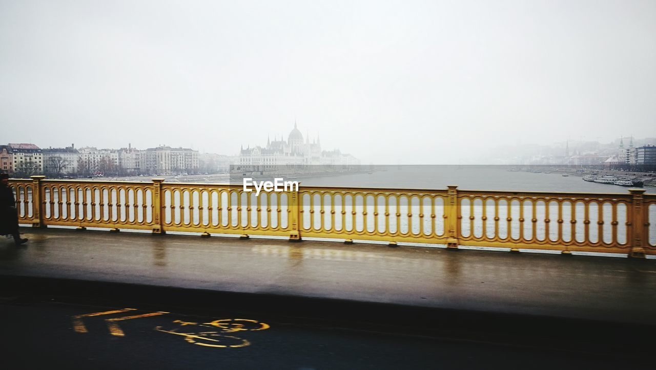 Bridge over water against clear sky