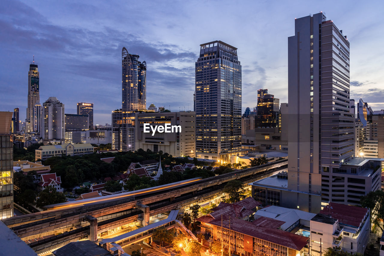 Bangkok, thailand - 10 august 2022 - aerial view of bangkok cityscape high-rises and bts skytrains