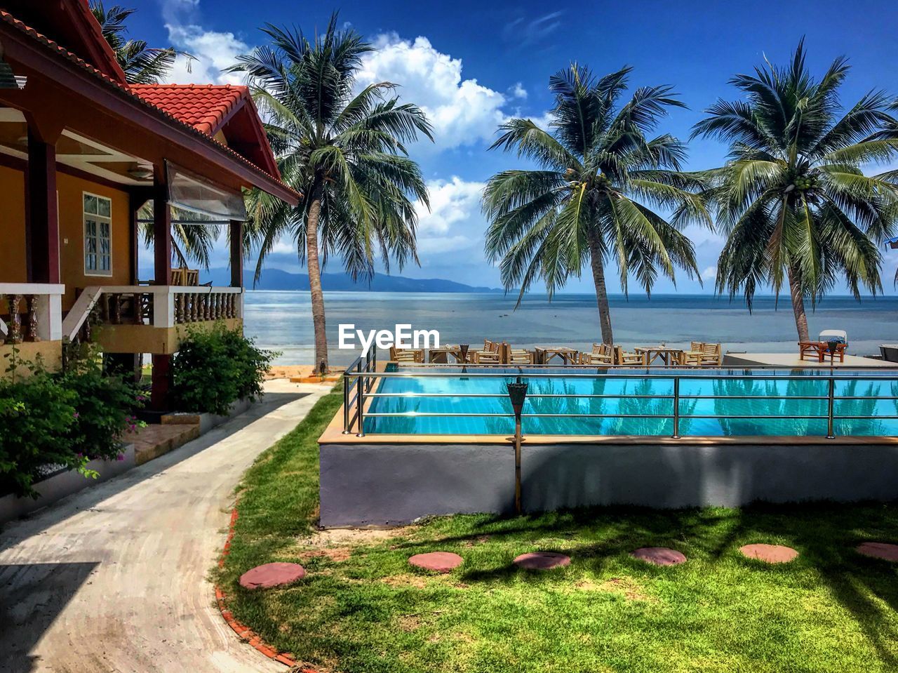 SWIMMING POOL BY SEA AGAINST SKY