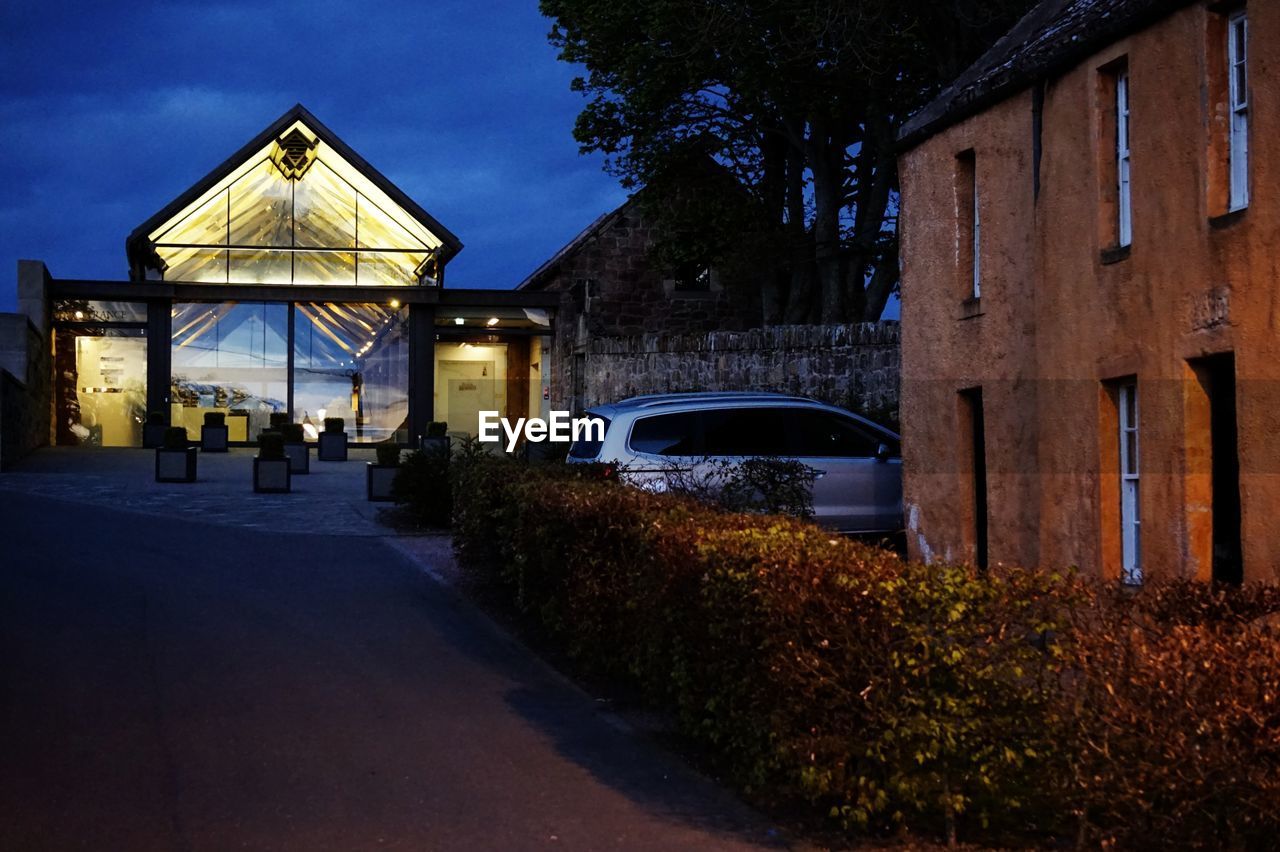 ILLUMINATED BUILDING AT NIGHT