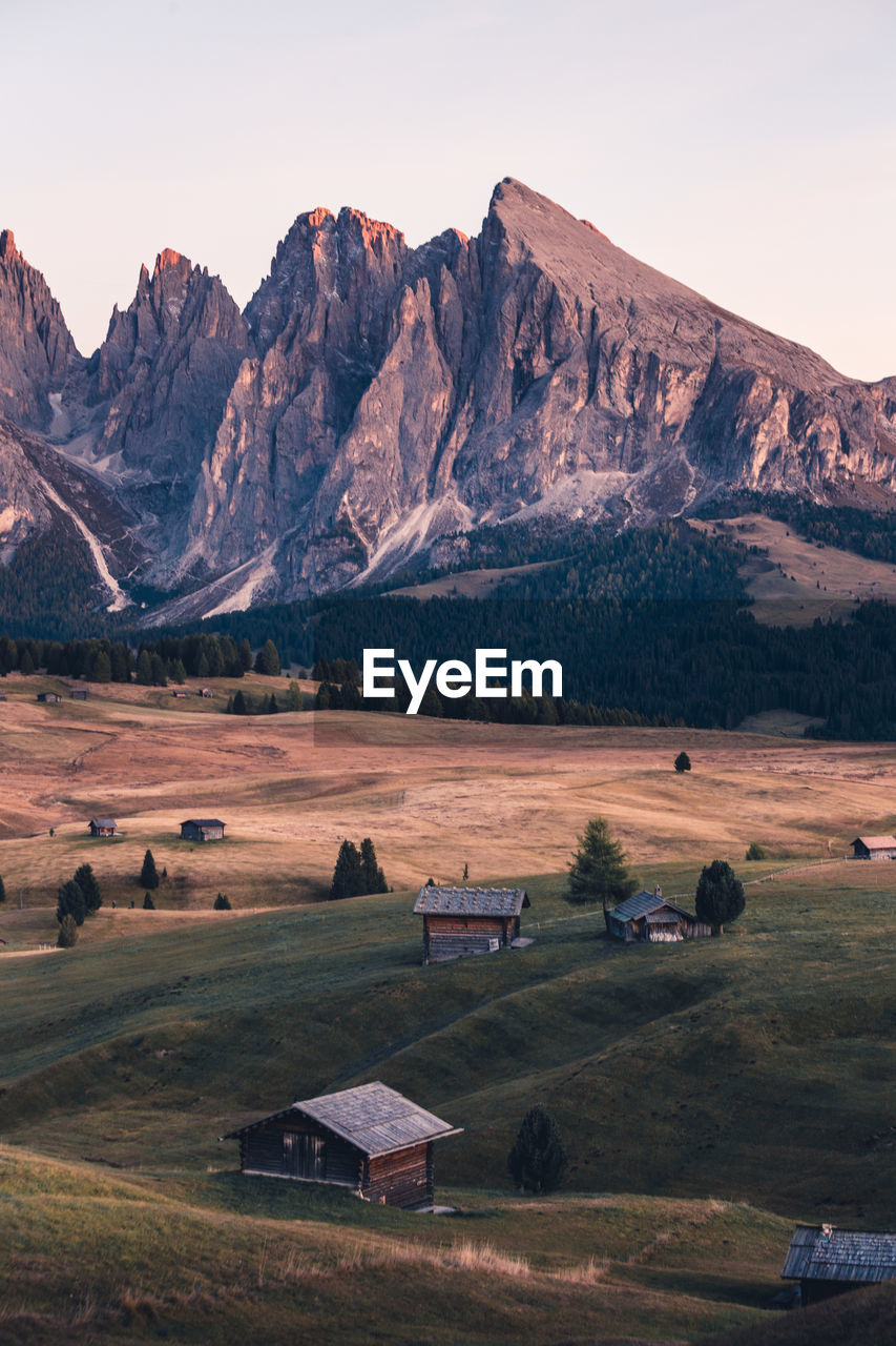 Scenic view of landscape and mountains against sky