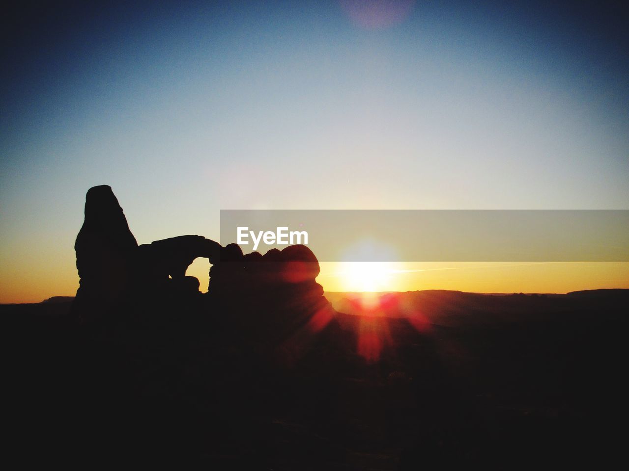 SILHOUETTE MAN AGAINST SKY DURING SUNSET