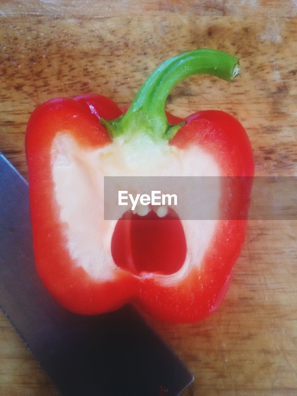 CLOSE-UP OF RED HEART SHAPE WITH HAND