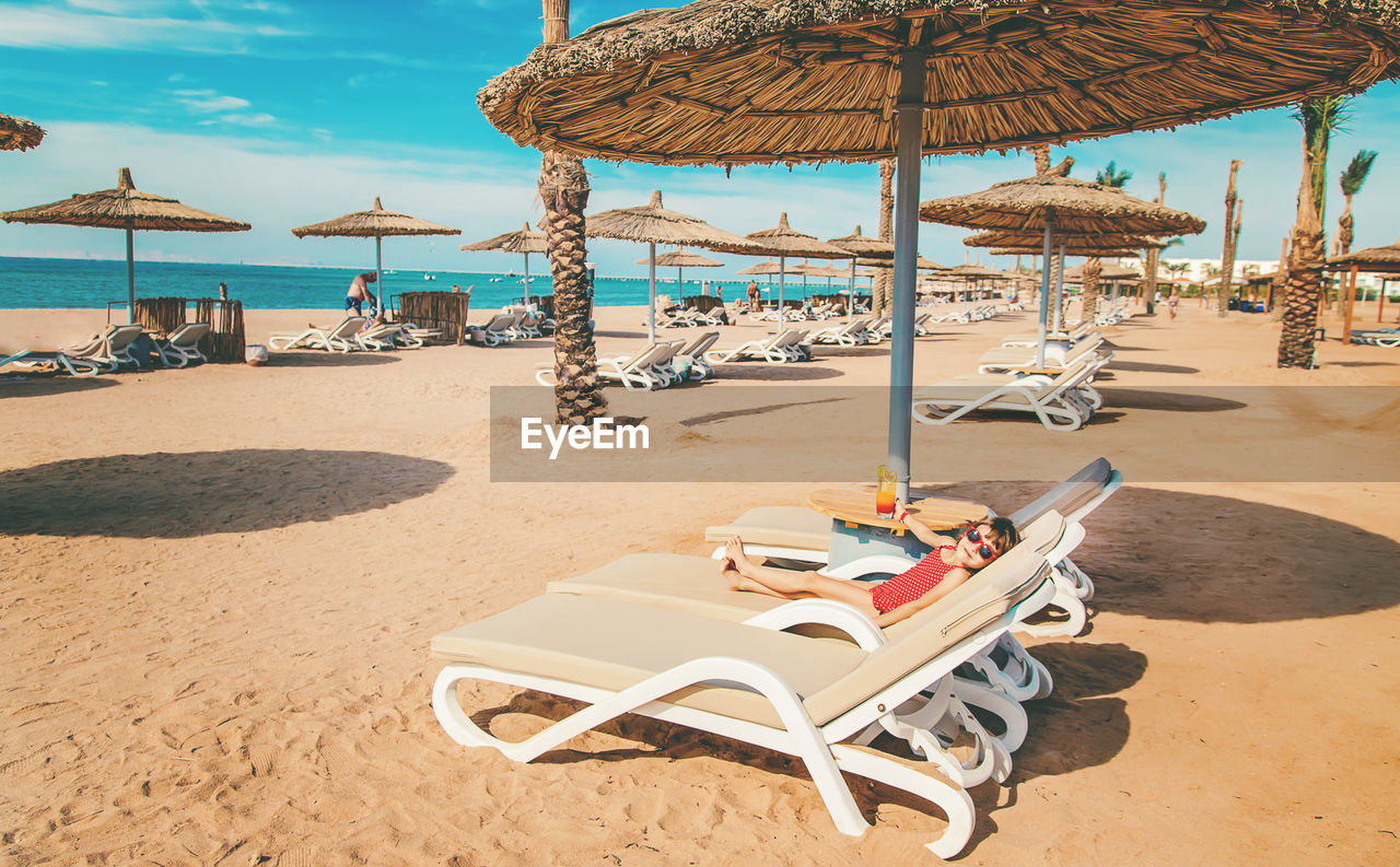 lounge chairs on beach