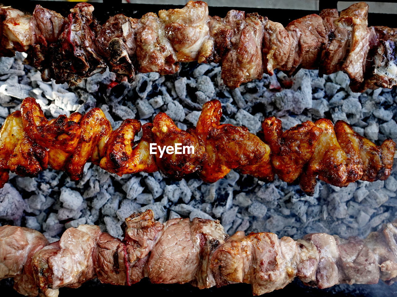 food and drink, food, grilling, meat, freshness, dish, barbecue, no people, cuisine, grilled, barbecue grill, roasting, day, fast food, still life, wellbeing, heat, healthy eating, high angle view, close-up, outdoors, outdoor grill, large group of objects