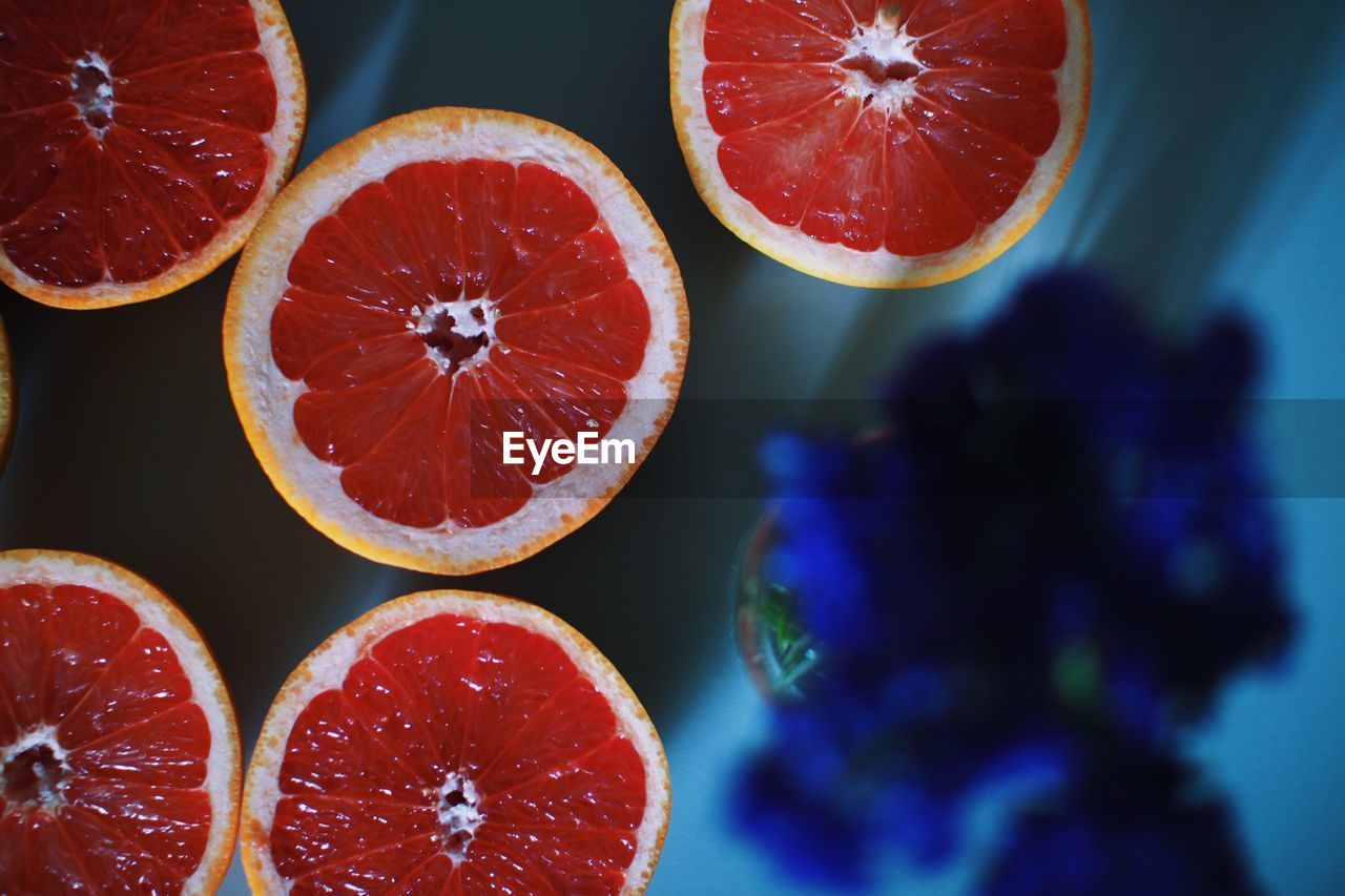 Directly above shot of grapefruit slices on table