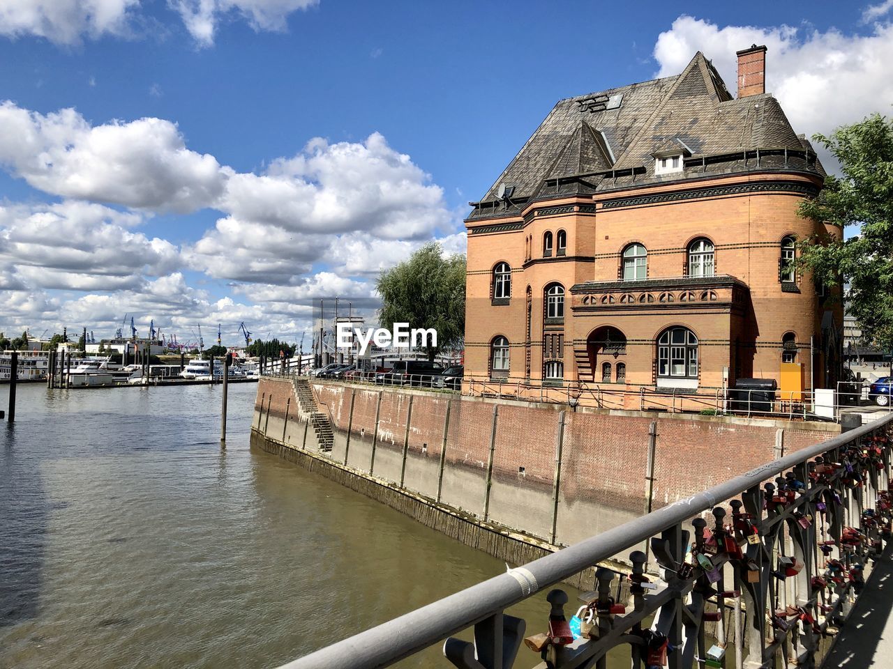 BRIDGE OVER CANAL AGAINST BUILDINGS