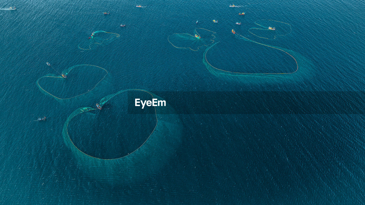 high angle view of boat sailing in sea