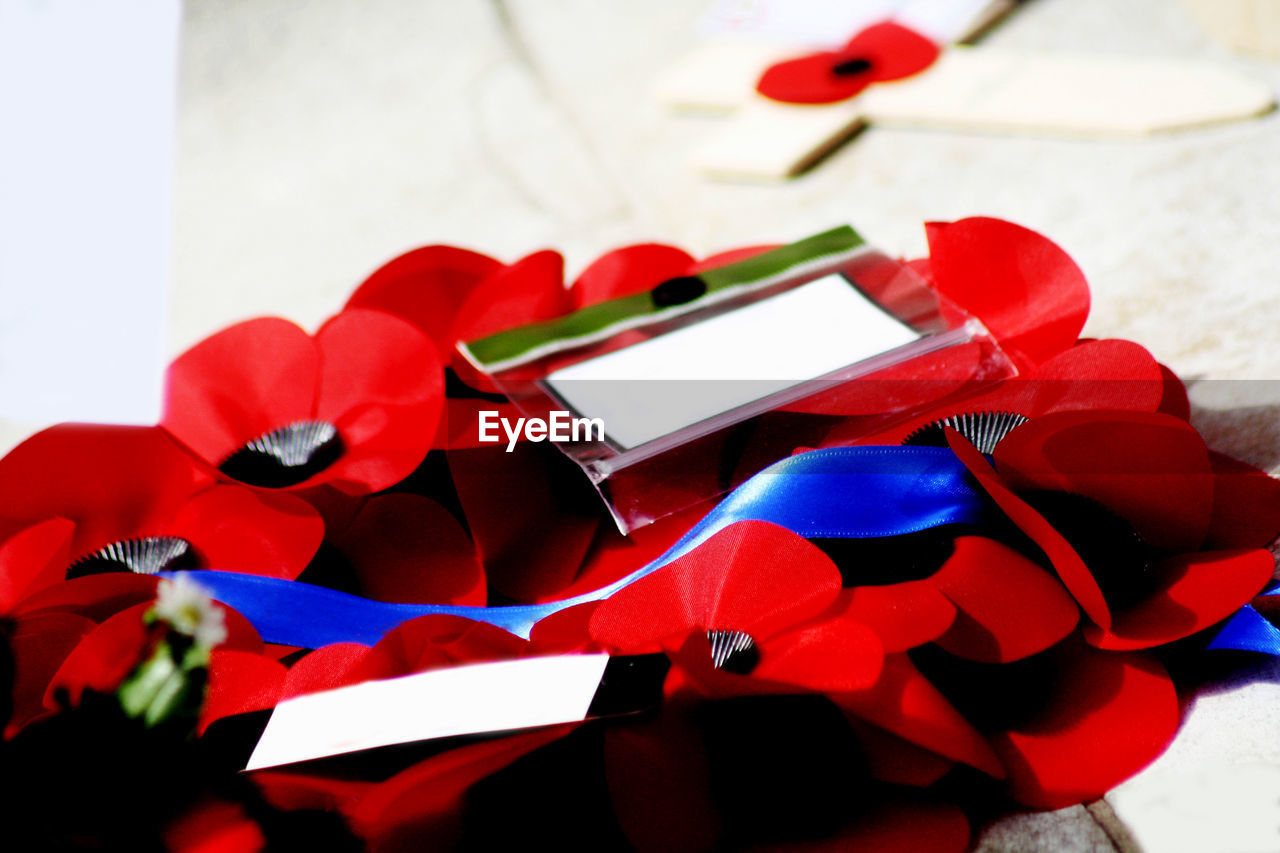 CLOSE UP OF MULTI COLORED RED TABLE