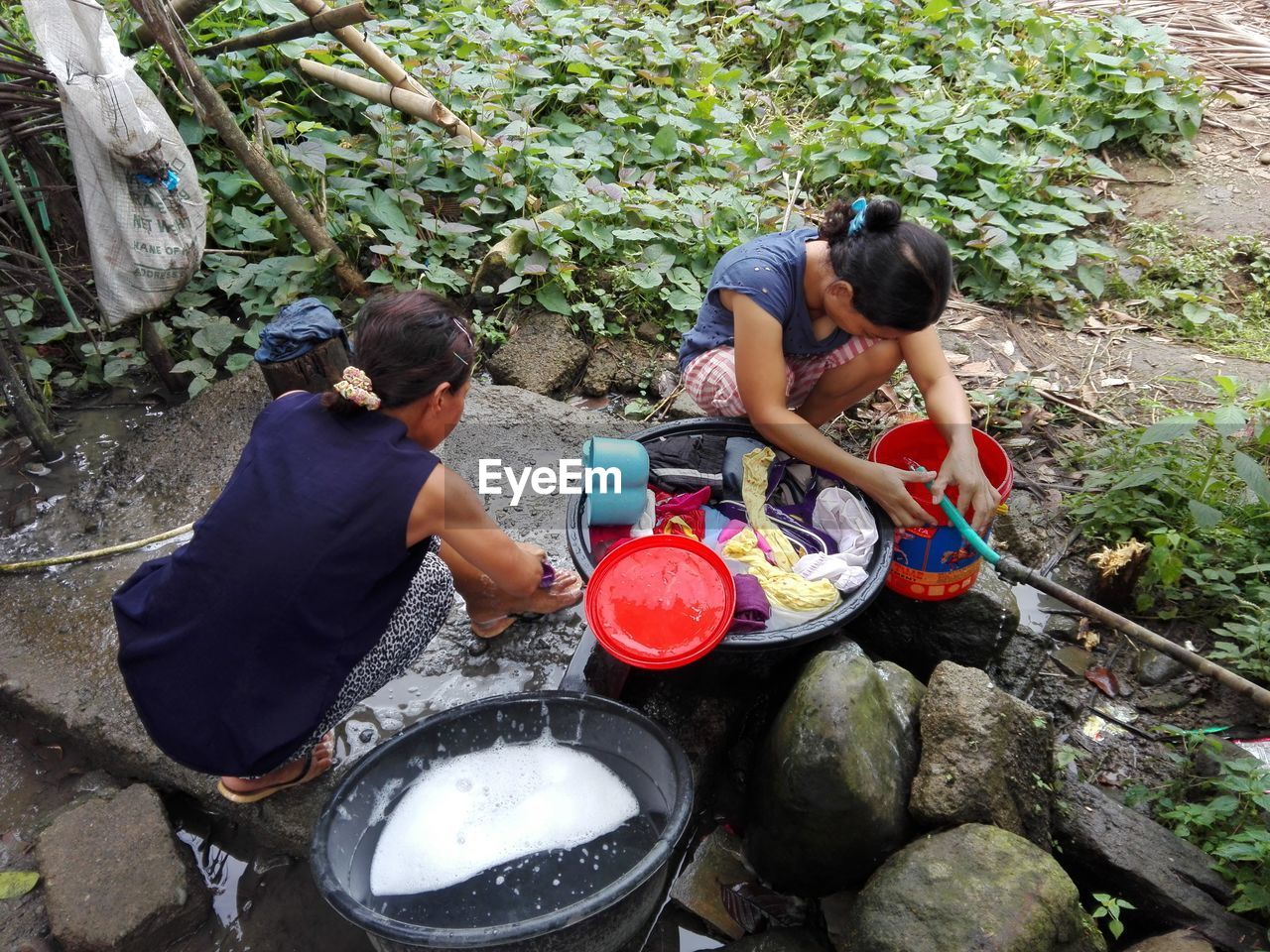 High angle view of women washing laundry