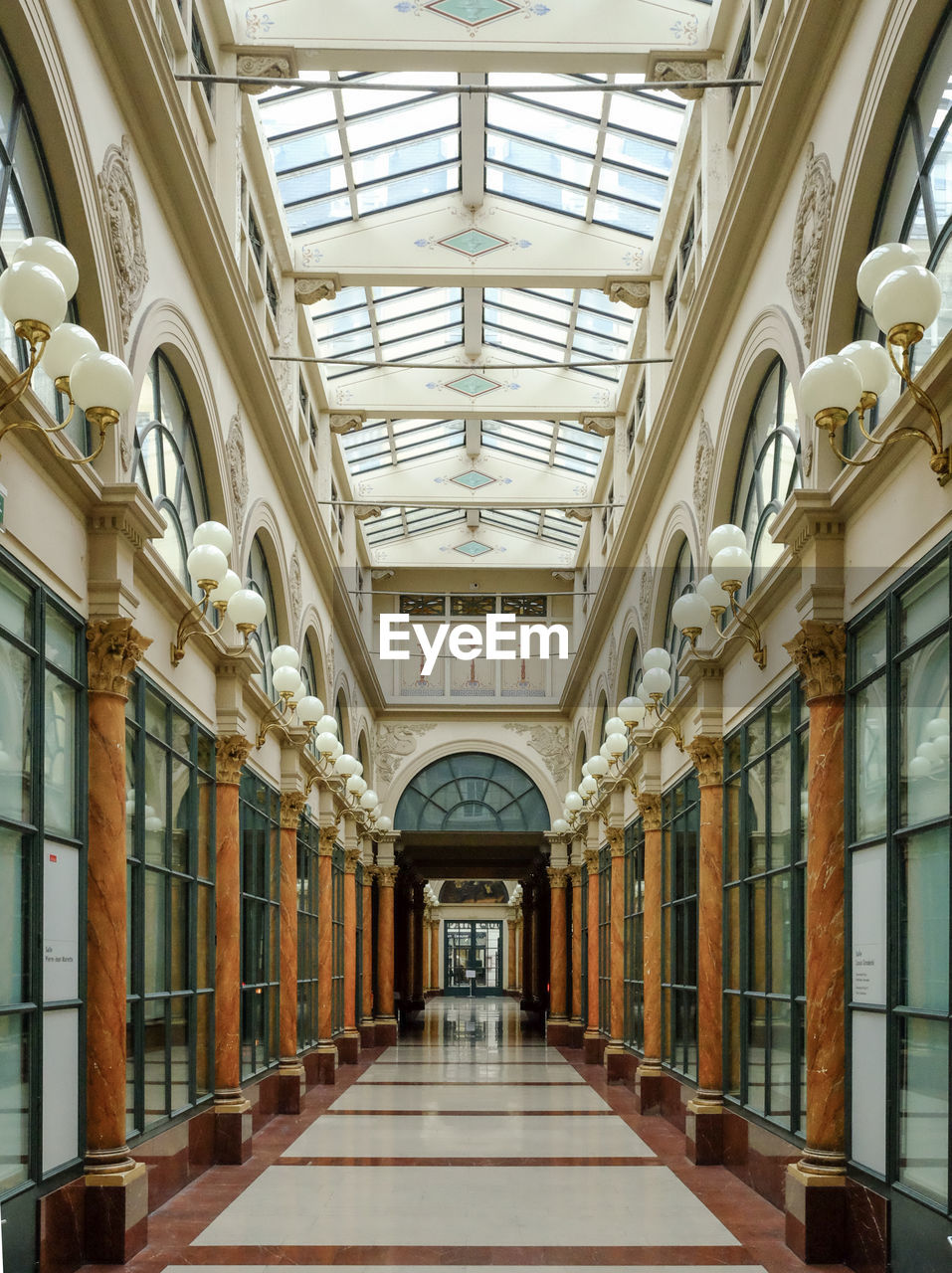 INTERIOR OF EMPTY CORRIDOR OF BUILDING