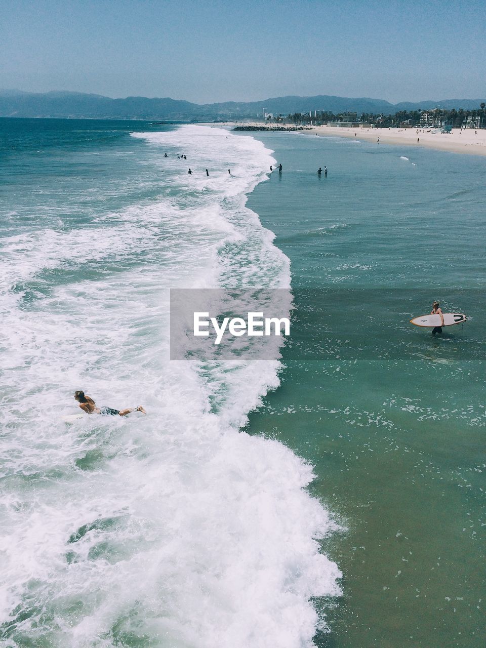 Scenic view of sea against sky during sunny day