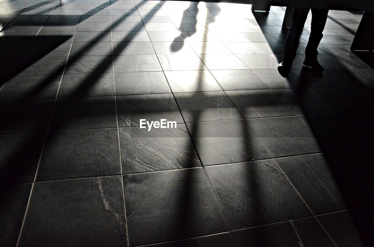 Shadow of person on floor