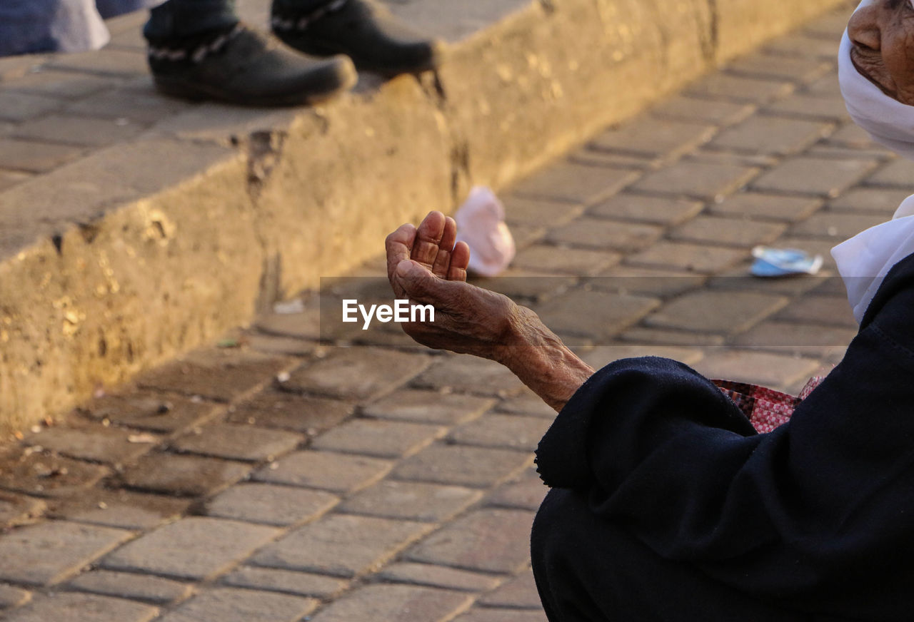 Man begging on street
