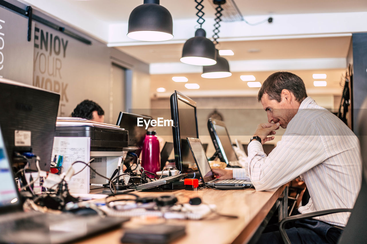 Man working at a coworking space