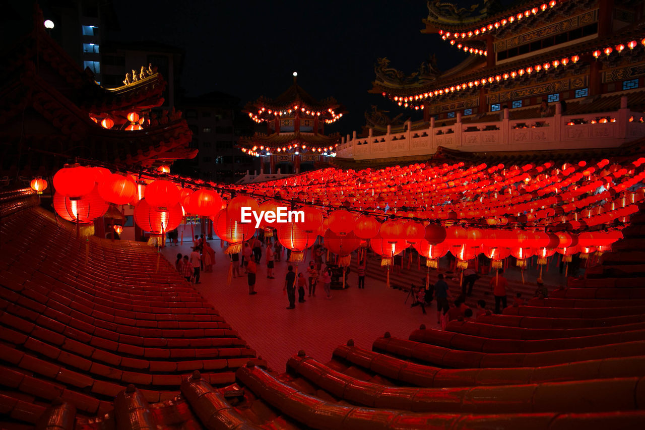 VIEW OF ILLUMINATED TRADITIONAL BUILDING