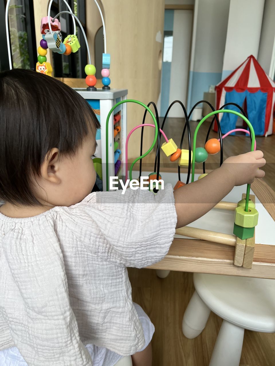 Girl playing with toys