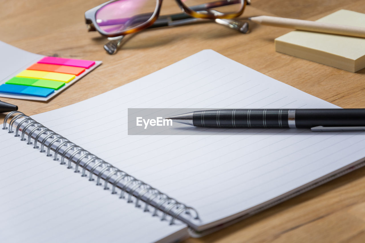 Close-up of office supplies on table