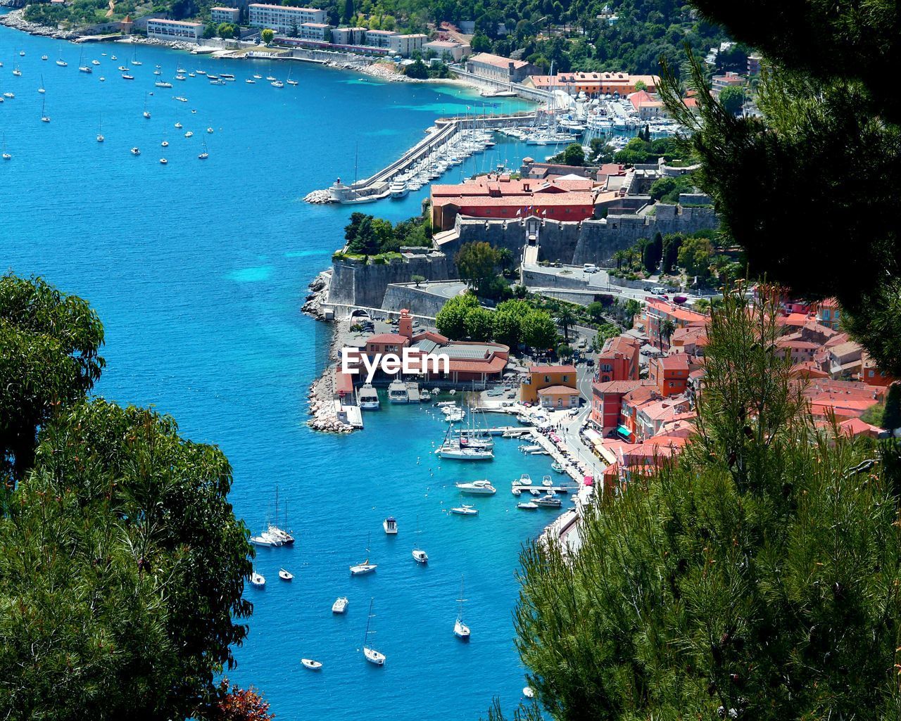 High angle view of harbor in town at french riviera