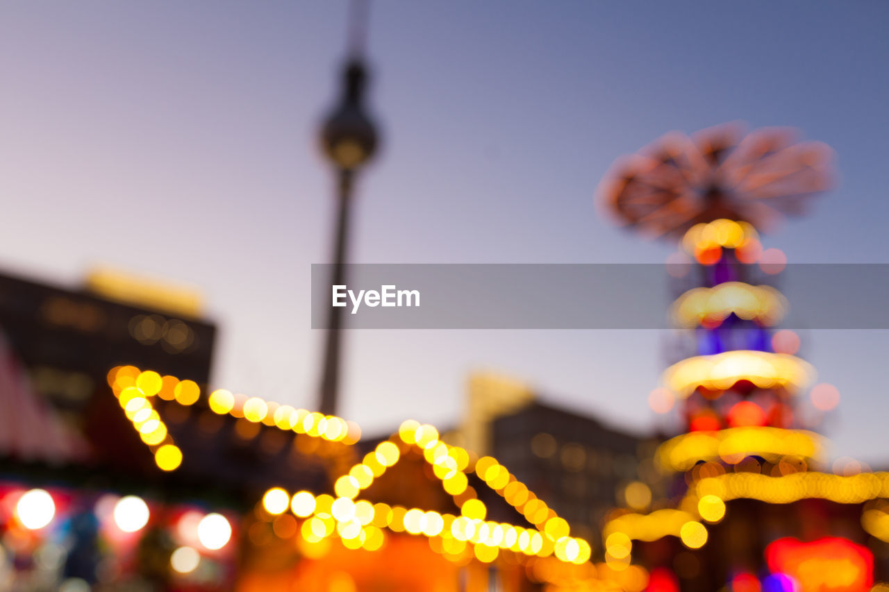 Christmas market in winter season, blurred background bokeh lights from berlin, germany