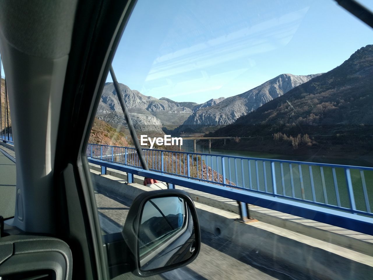 SCENIC VIEW OF LANDSCAPE AGAINST SKY SEEN THROUGH BOAT