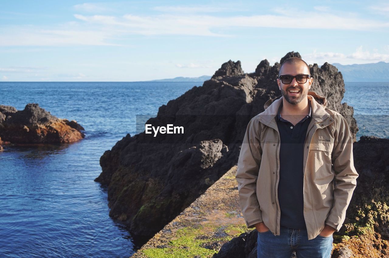 Happy tourist on the seashore