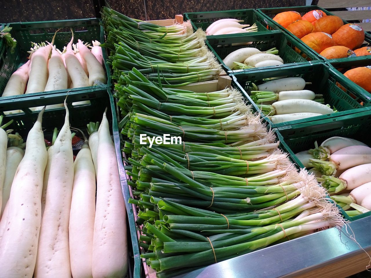 HIGH ANGLE VIEW OF VEGETABLES FOR SALE IN MARKET STALL