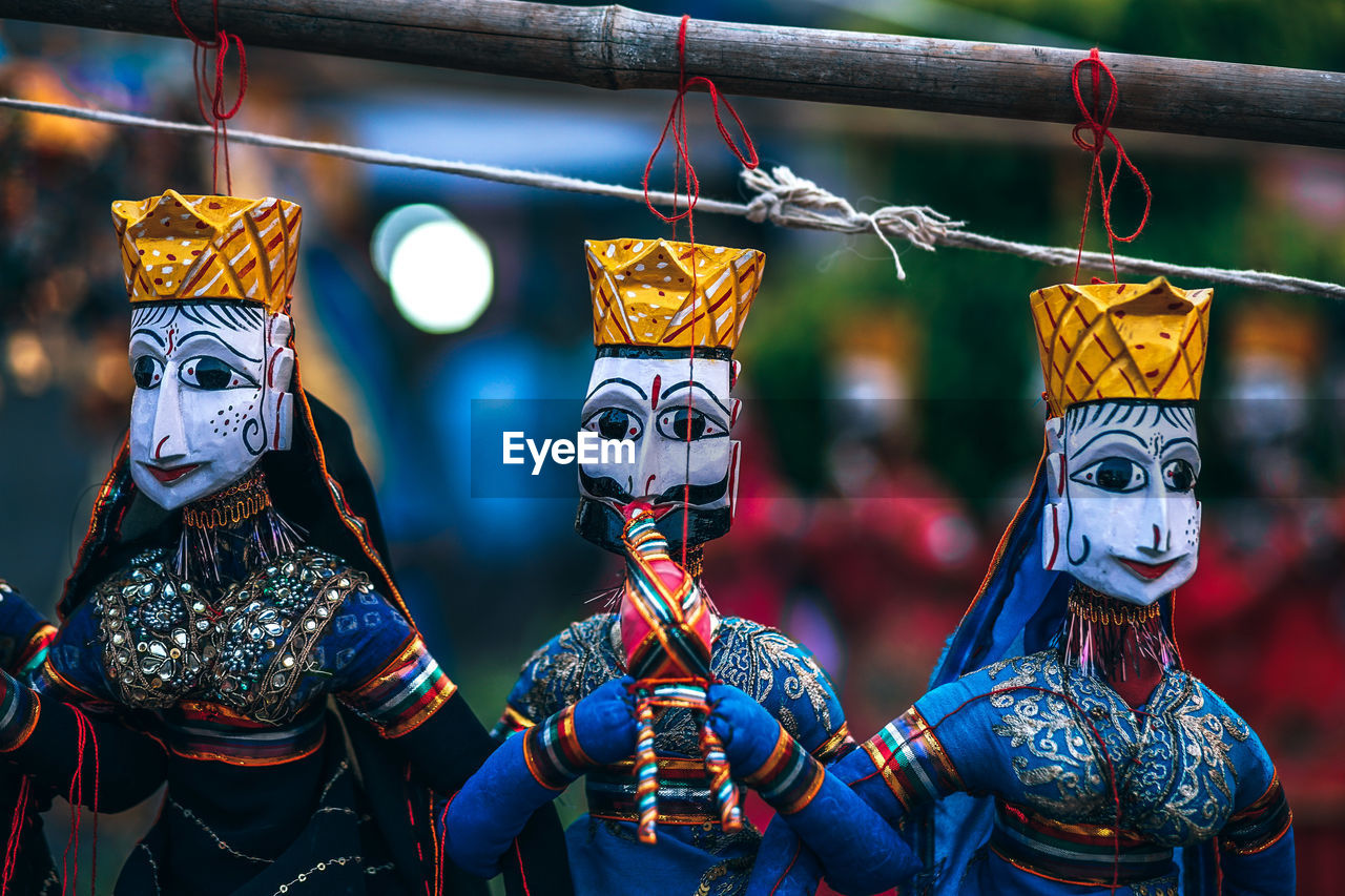 Close-up of toy hanging at market stall