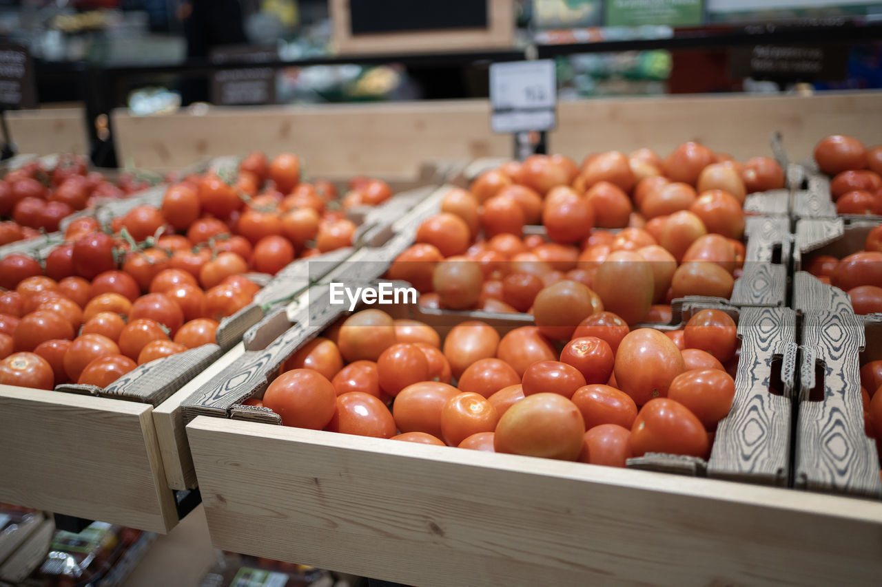 Fresh organic red pear tomatoes in a supermarket