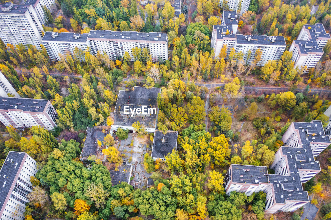 Ukraine, kyiv oblast, pripyat, aerial view of rooftops of abandoned city in autumn