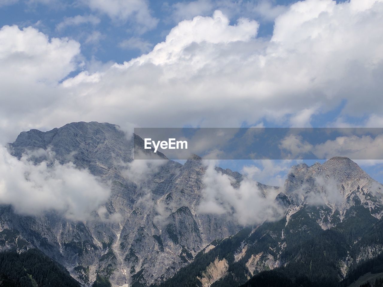 Scenic view of mountains against sky during winter