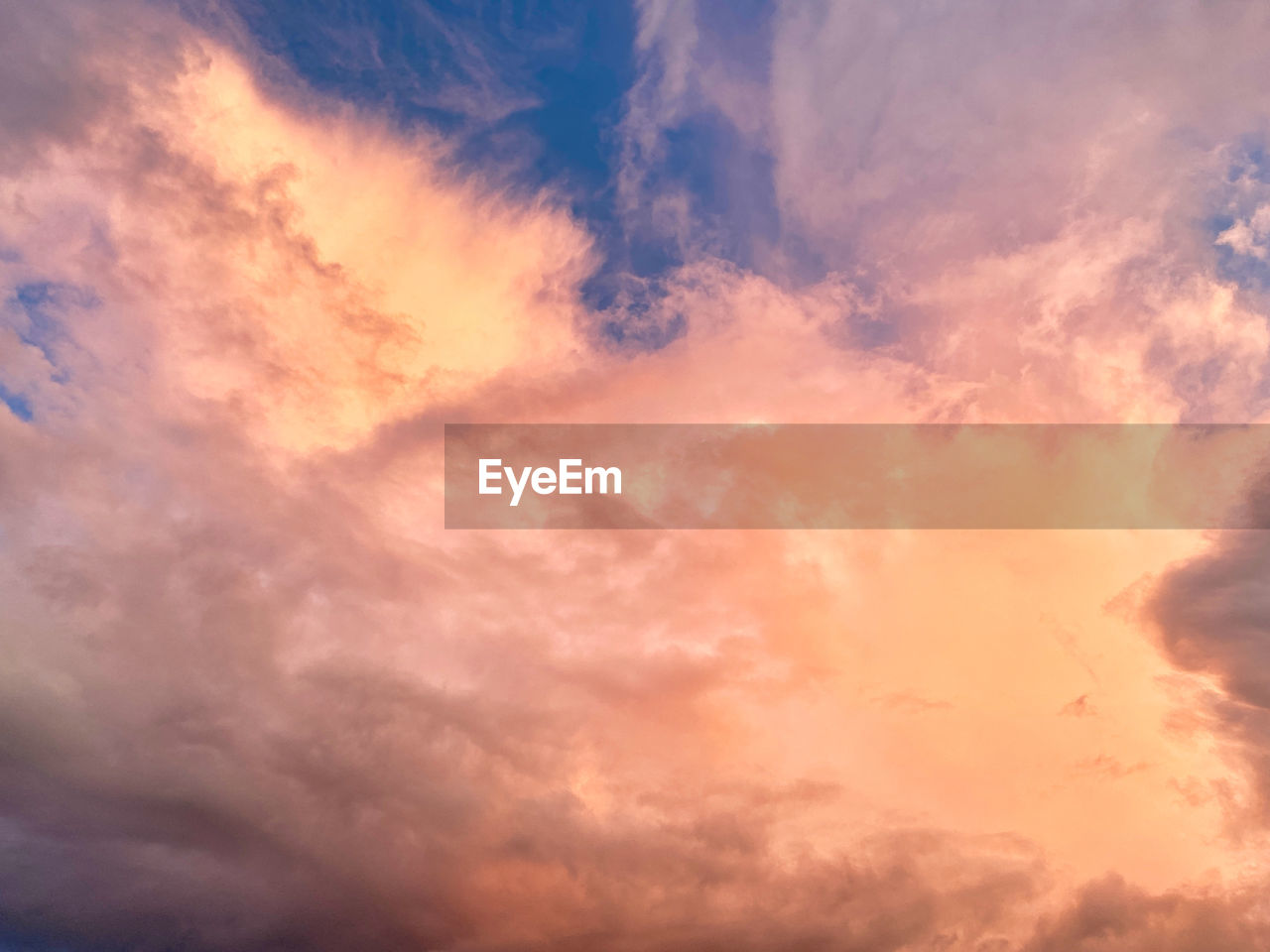 Low angle view of clouds in sky during sunset