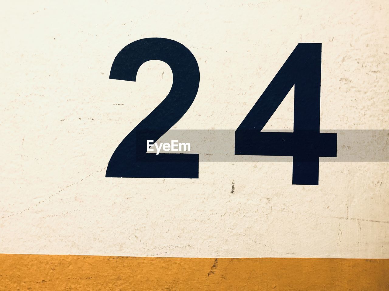 CLOSE-UP OF TEXT ON WALL