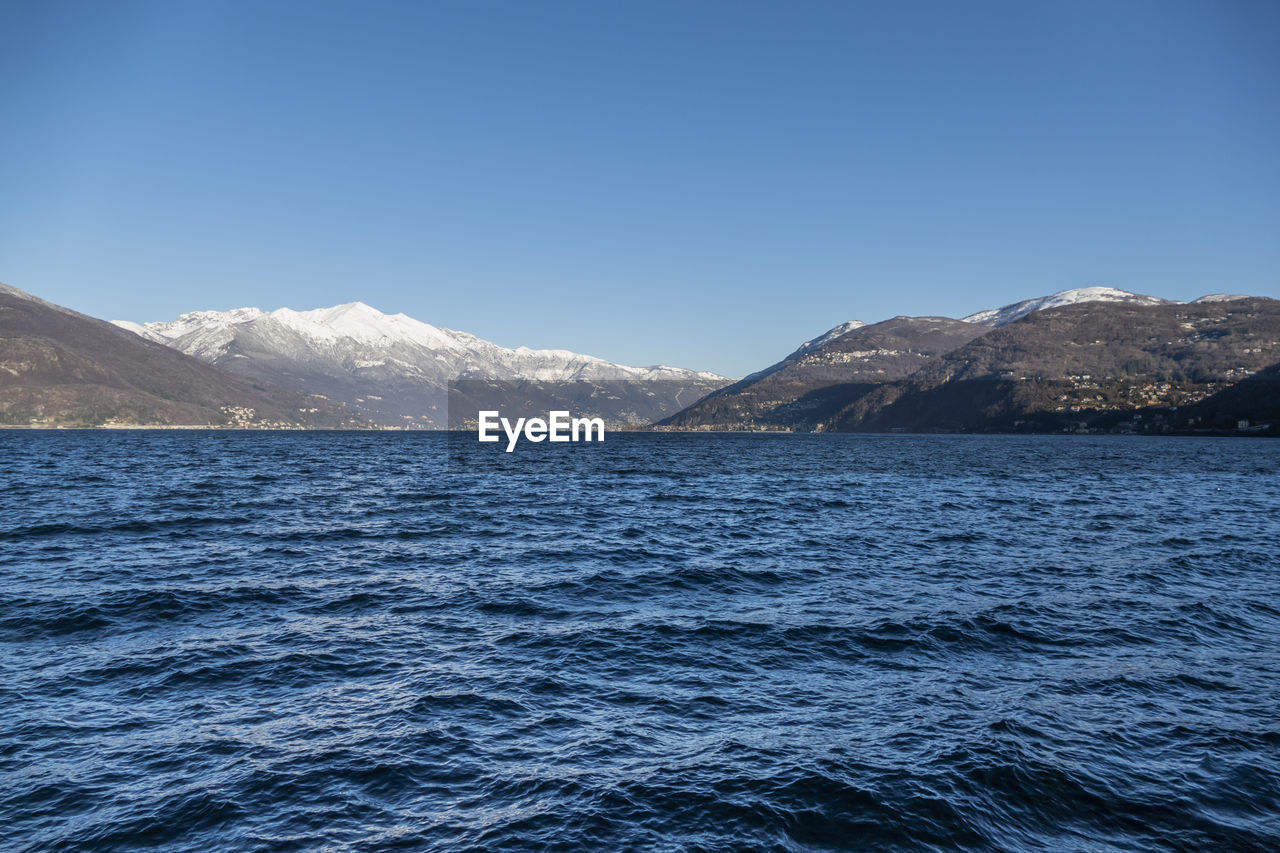 Lake maggiore with the snow-capped mountains in the background