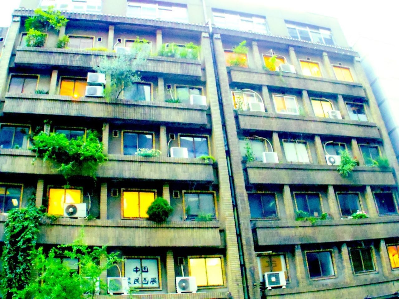 LOW ANGLE VIEW OF RESIDENTIAL BUILDING