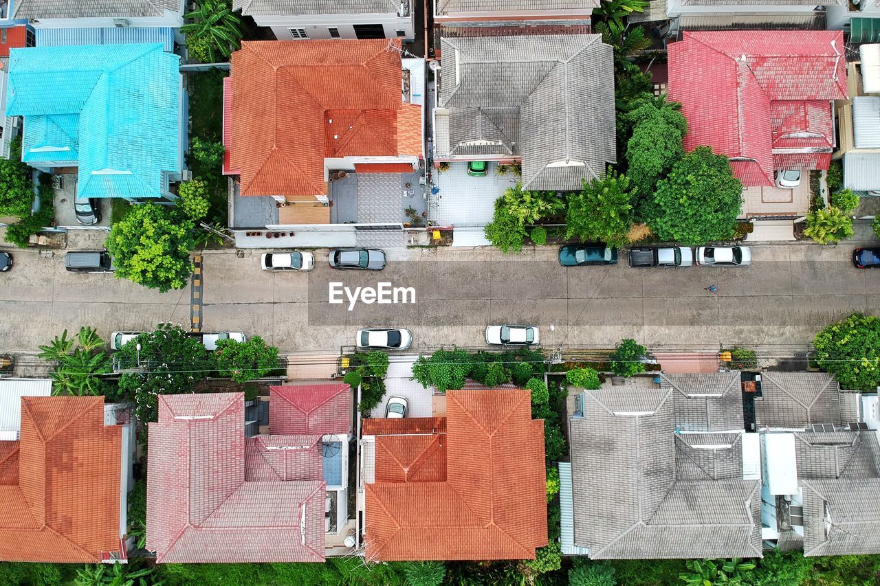 High angle view of plants and buildings in city