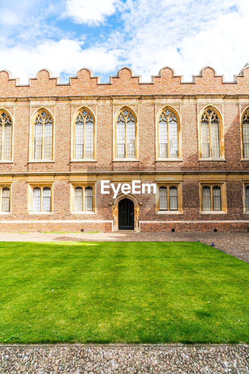 FACADE OF LAWN OUTSIDE BUILDING