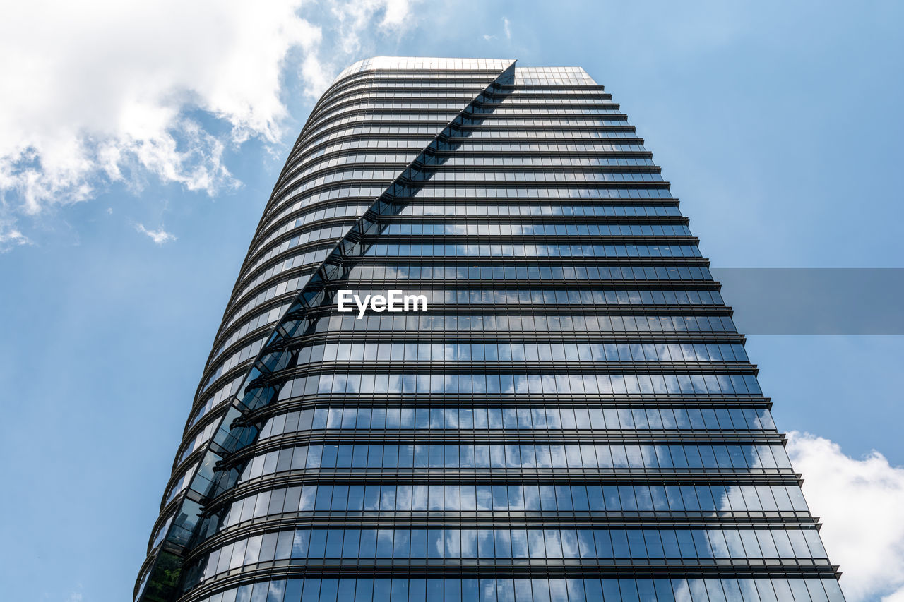 Low angle view of modern building against sky