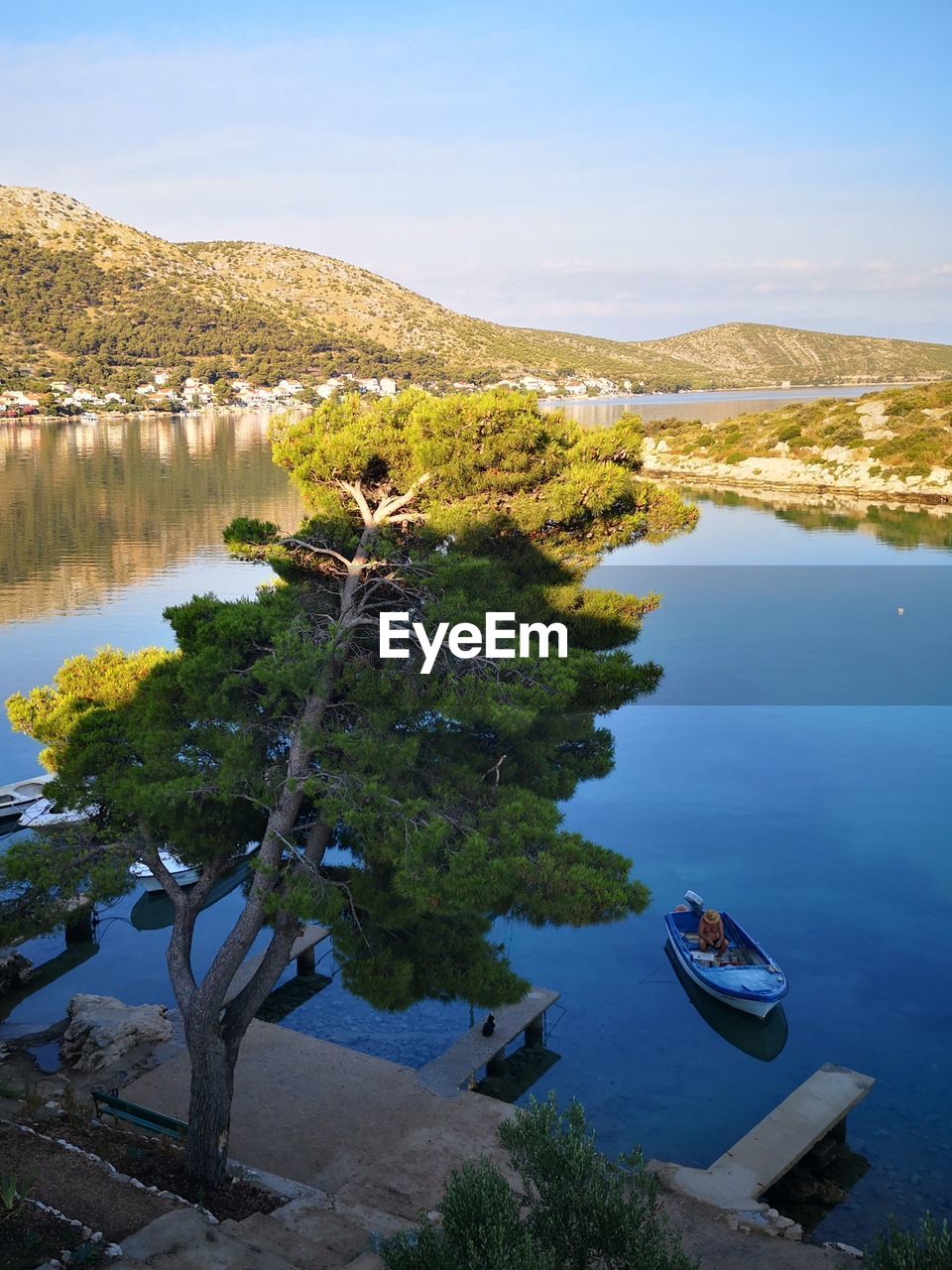 HIGH ANGLE VIEW OF LAKE BY TREES AGAINST SKY