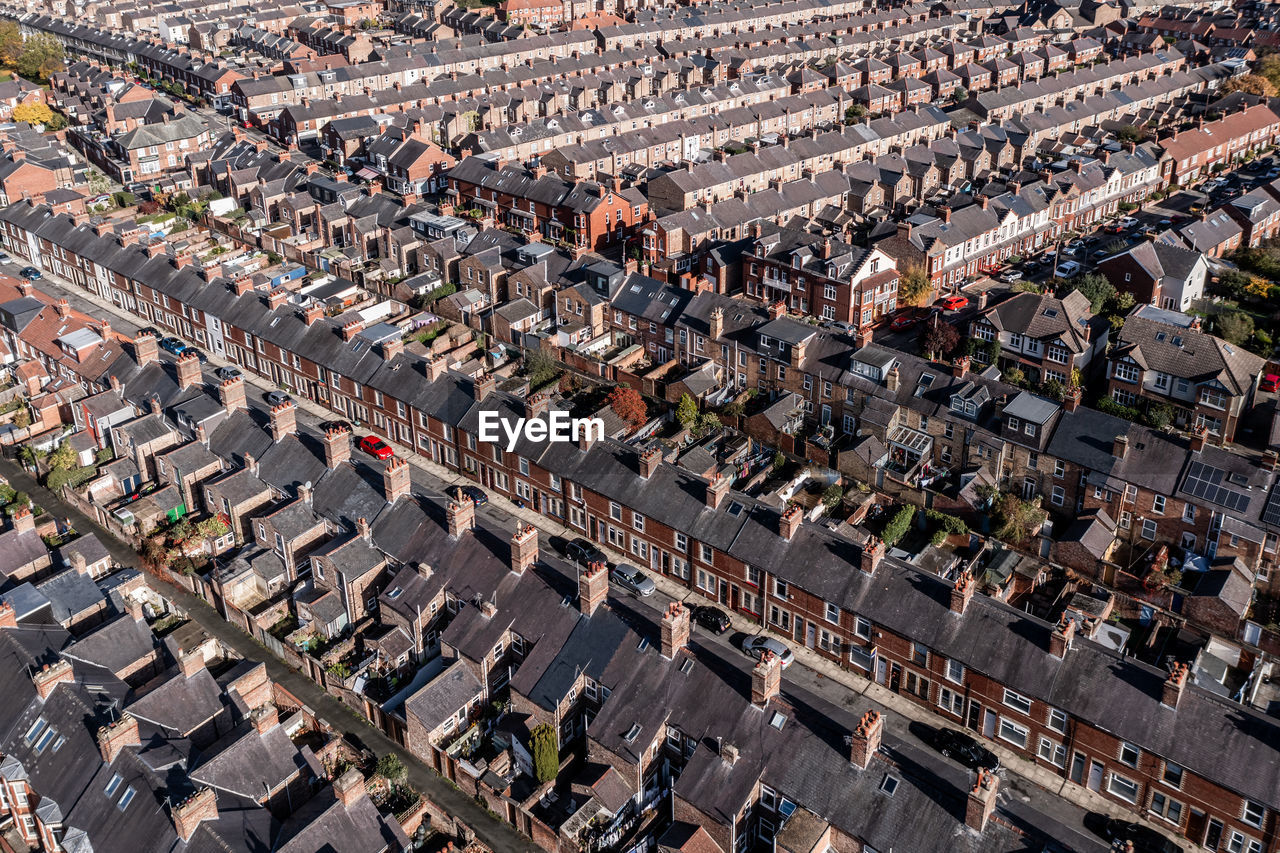 Aerial view of the rooftops old terraced houses on back to back streets in the suburbs of a uk city