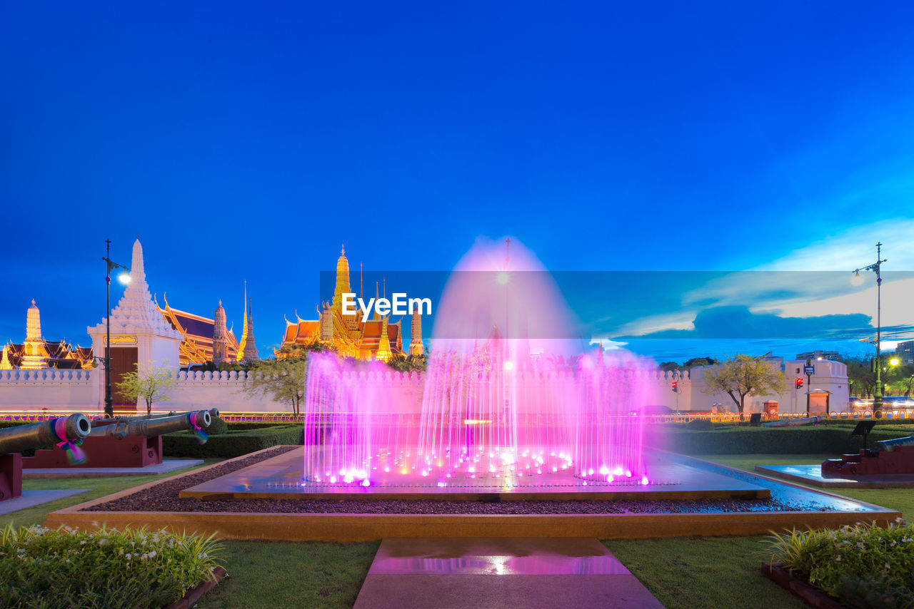 ILLUMINATED FOUNTAIN AGAINST SKY