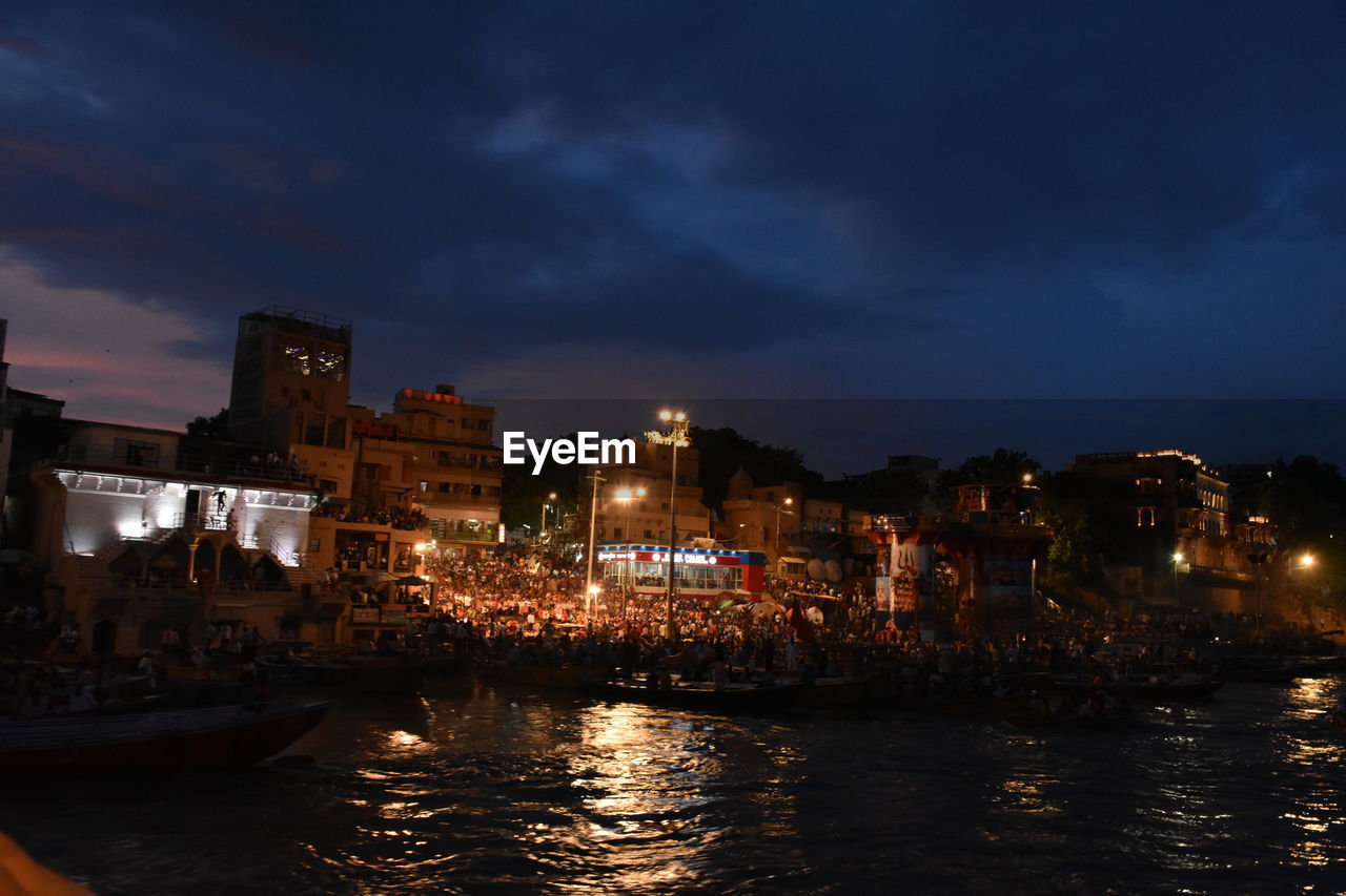 Illuminated buildings in city at night