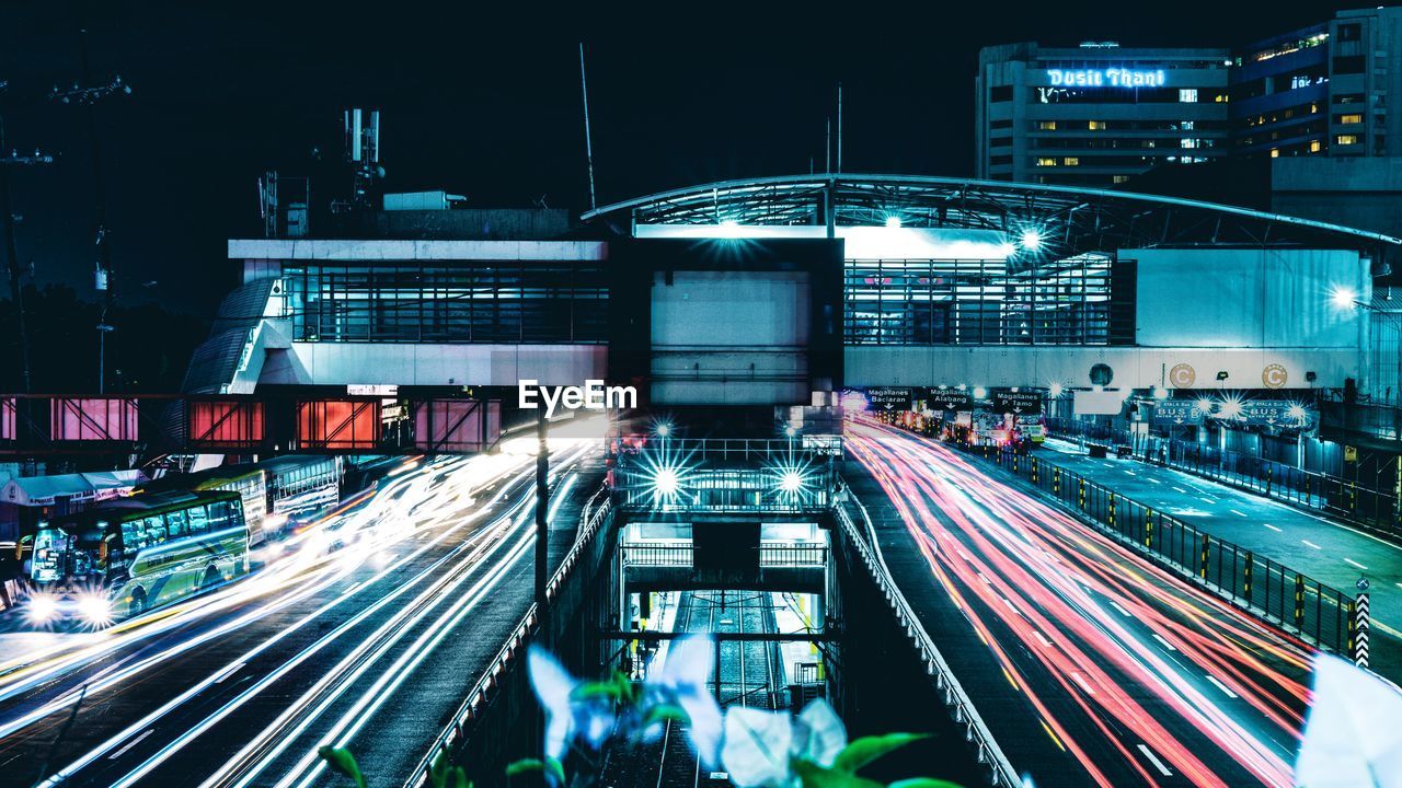 High angle view of light trails on road at night