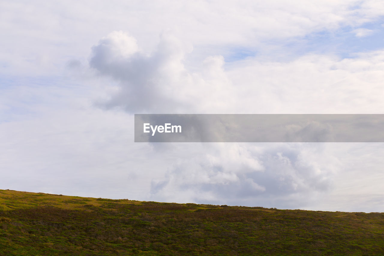 LOW ANGLE VIEW OF SKY OVER LAND