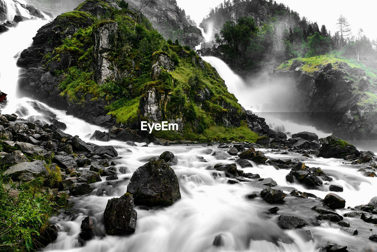 SCENIC VIEW OF WATERFALL