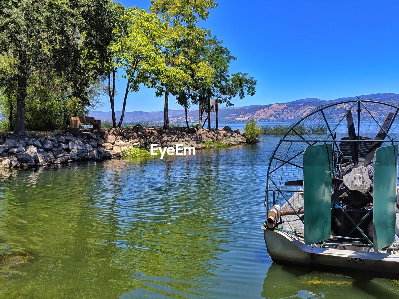 Lake view mountains. air or fan boat in foreground. fishing area.