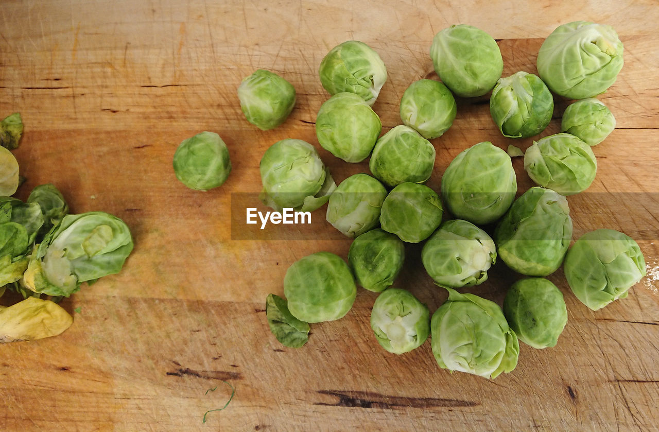 Brussels sprouts on wooden table. view from above