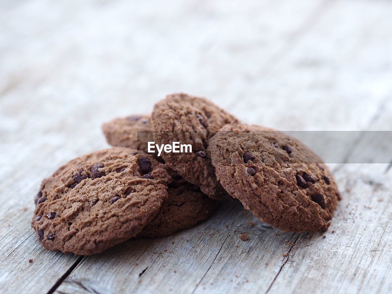 High angle view of chocolate cookies on wooden table